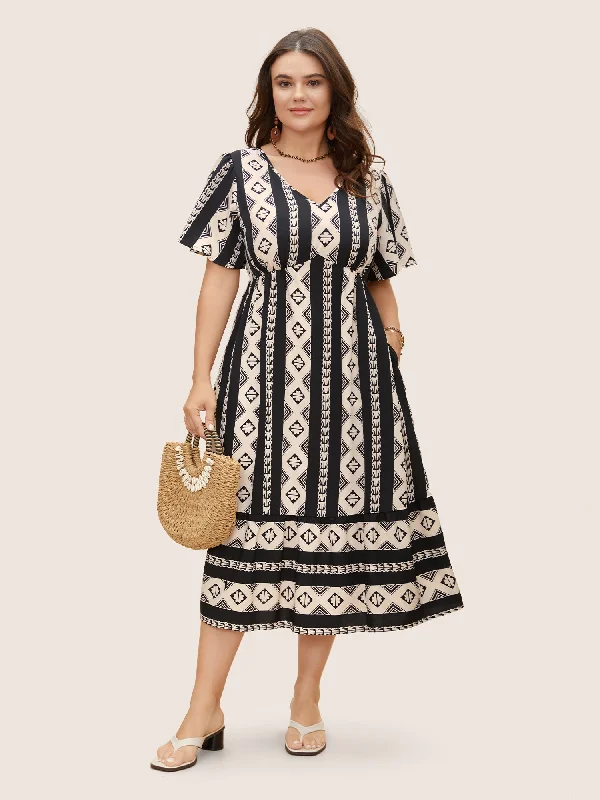 Plus size dresses featuring metallic hues shine soft -Plus size dresses for dinner parties -Bandana Geometric Flutter Sleeve Midi Dress