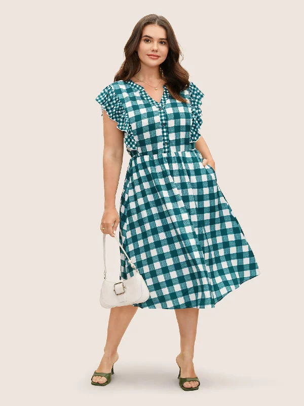 Plus size dresses for wet weather stay dry -Plus size dresses with v-necklines for a flattering look -Plaid Notched Ruffle Cap Sleeve Midi Dress