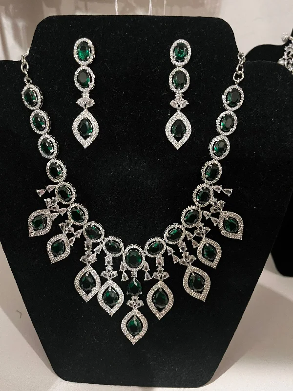 Best necklaces and pendants with emerald gemstones for a rich, sophisticated design-Dazzling Green Color Stone Worked American Diamond Unique Designed Necklace Set