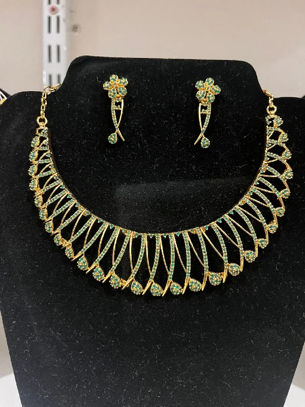 Best necklaces and pendants with opal and gold for a vibrant, luxurious contrast-Flashing Light Green Color Stone Design American Diamond Necklace With Earrings