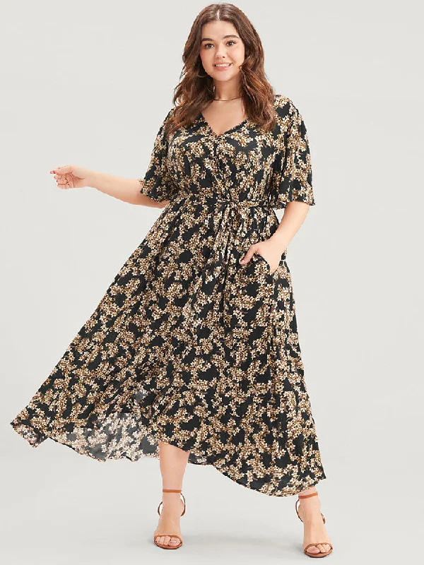 Plus size dresses featuring beaded hems are ornate -Plus size dresses with v-necklines for a flattering look -Floral Print Wrap Ruffles Pocket Belted Asymmetrical Hem Dress