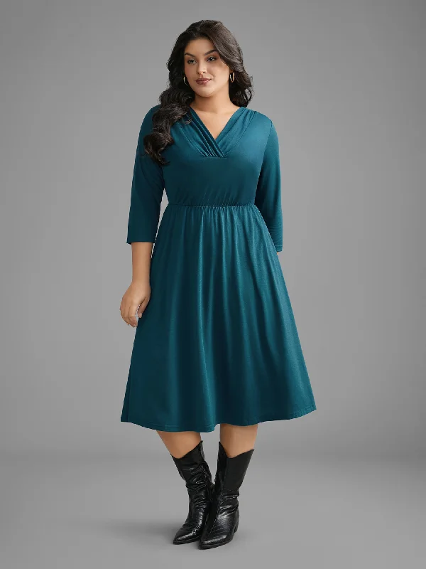 Plus size dresses for bold looks stand out -Dressy plus size dresses for family gatherings -V Neck Gathered Midi Knit Dress