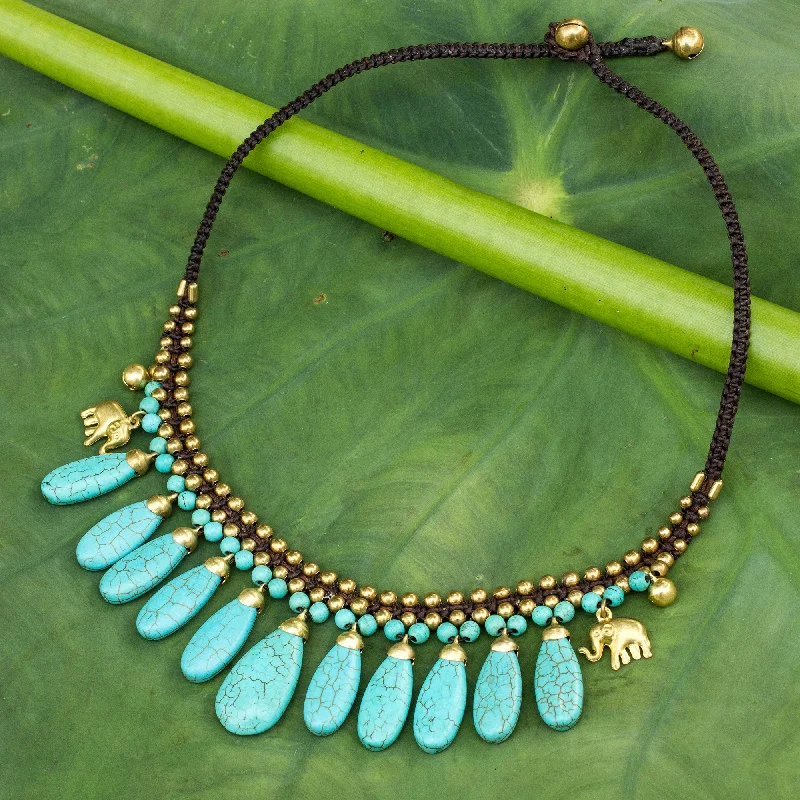 Best necklaces and pendants with heart-shaped designs for a romantic look-Siam Legacy Beaded Turquoise Colored Elephant Necklace