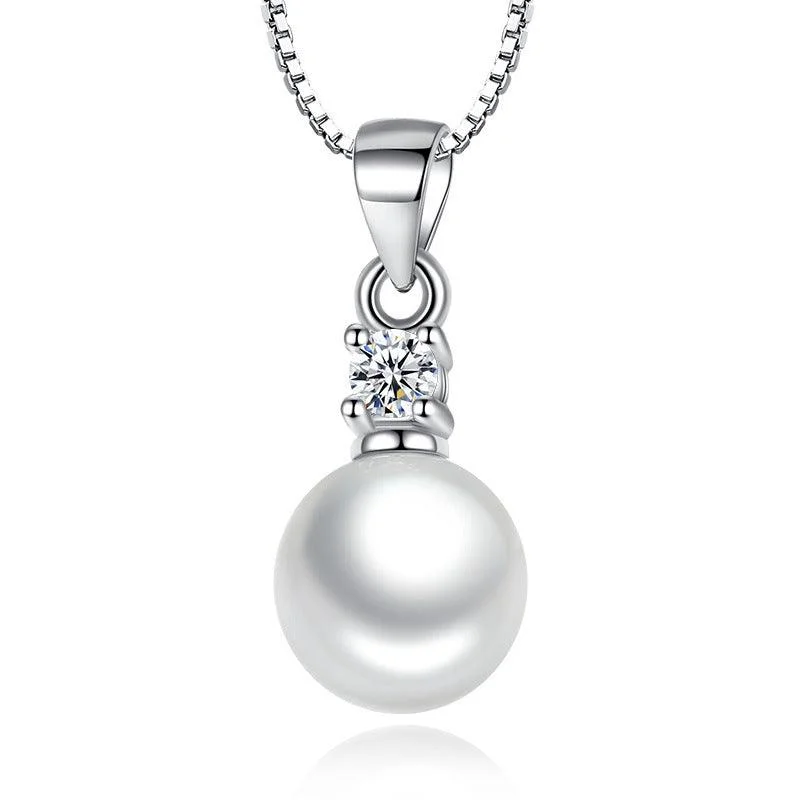 Best necklaces and pendants with opal and gold for a vibrant, luxurious contrast-Pearl Pendant Necklace with Cubic Zirconia Accent Stone Necklace