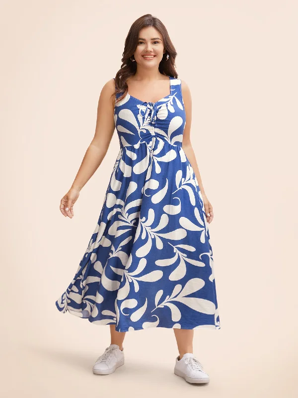 Plus size dresses featuring fuzzy accents are warm -Plus size dresses for bridesmaids with varying styles -Silhouette Floral Print Drawstring Midi Dress