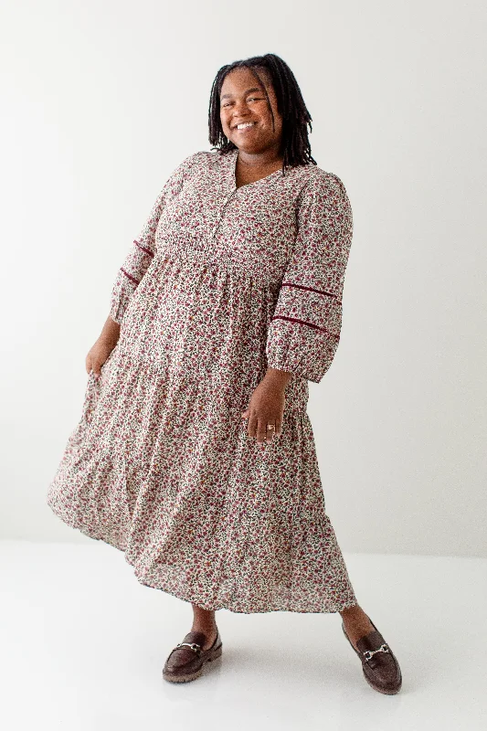 Plus size dresses with sleek fits elongate frames -Plus size dresses with high-low hems for variety -Plus 'Cadence' Floral Print Button Front Tiered Midi Dress in Cream