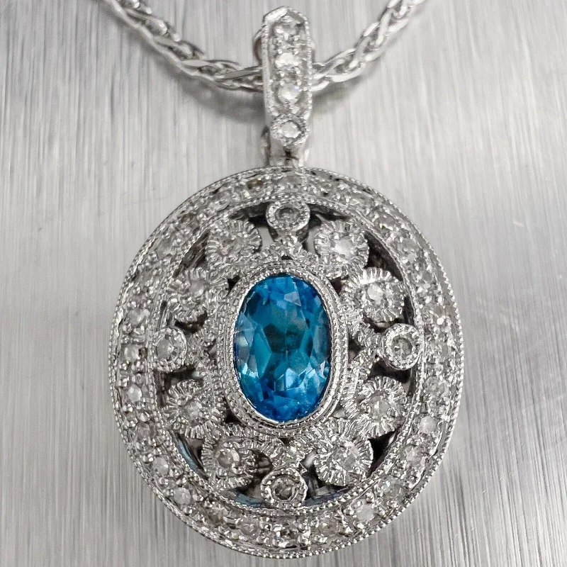 Unique necklaces and pendants with tree of life motifs for nature-inspired elegance-14k White Gold Oval Topaz Diamond Locket Pendant Necklace 0.35ctw 20"