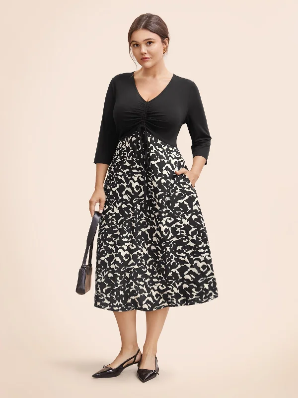 Plus size dresses featuring ruffle details add charm -Plus size dresses with v-necklines for a flattering look -V Neck Patchwork Drawstring Dress