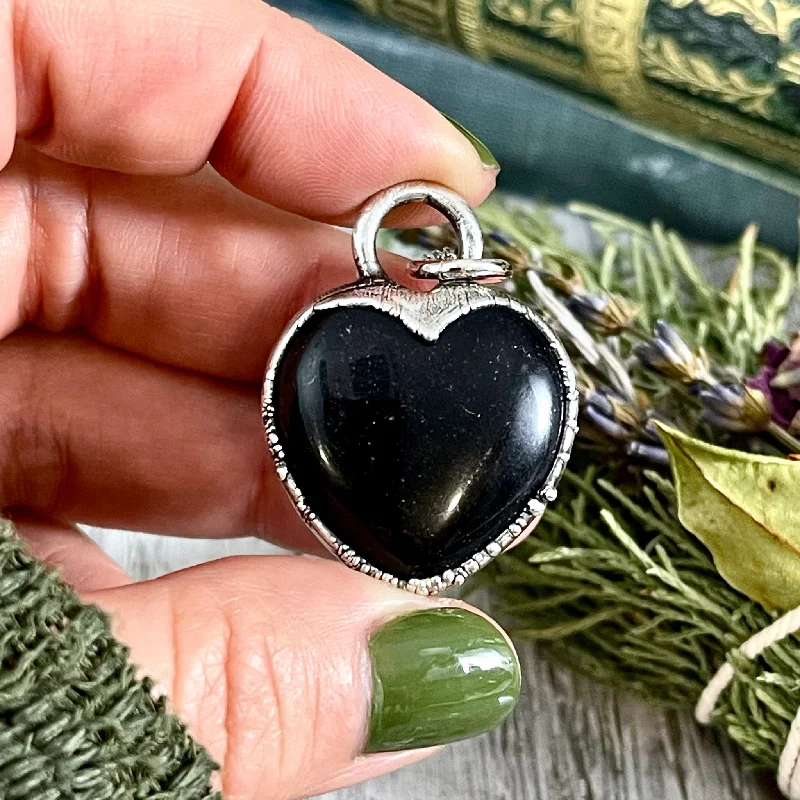 Necklaces and pendants with pearls for a classic and sophisticated touch-Black Obsidian Crystal Heart Necklace In Fine Silver