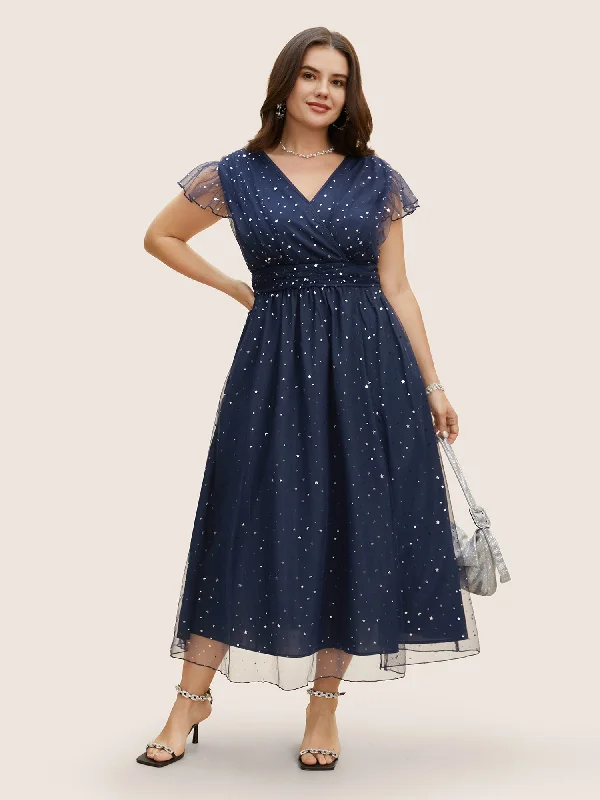 Trendy plus size dresses with bold prints stand out -Plus size dresses with bold colors for a statement look -Sequin Mesh V Neck Ruffle Cap Sleeve Dress