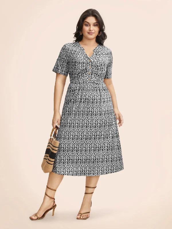 Plus size dresses with A-line cuts flatter curves -Plus size dresses with long sleeves for winter -Boho Print Notched Collar Ruched Dress