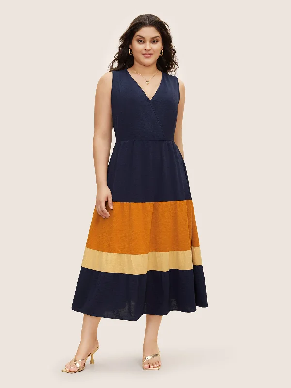 Plus size dresses with fitted bodices shape beautifully -Plus size dresses with tiered skirts for a fun look -Patchwork Contrast Overlap Collar Sleeveless Dress