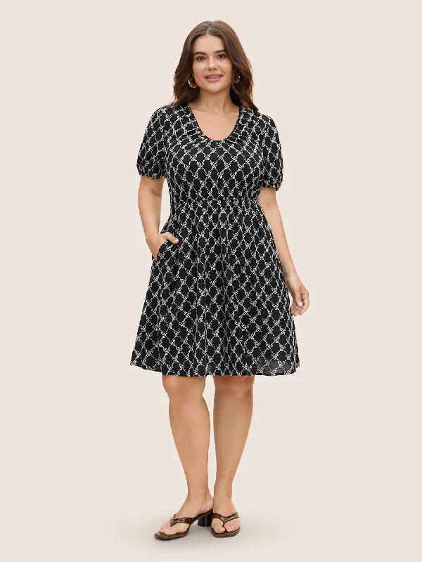 Plus size dresses with soft skirts feel light -Plus size dresses with tiered skirts for a fun look -U Neck Geometric Tie Knot Puff Sleeve Dress