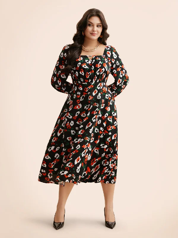 Plus size dresses with unique cuts stand apart -Plus size dresses with a flowing skirt for ease of movement -Square Neck Animal Print Keyhole Dress