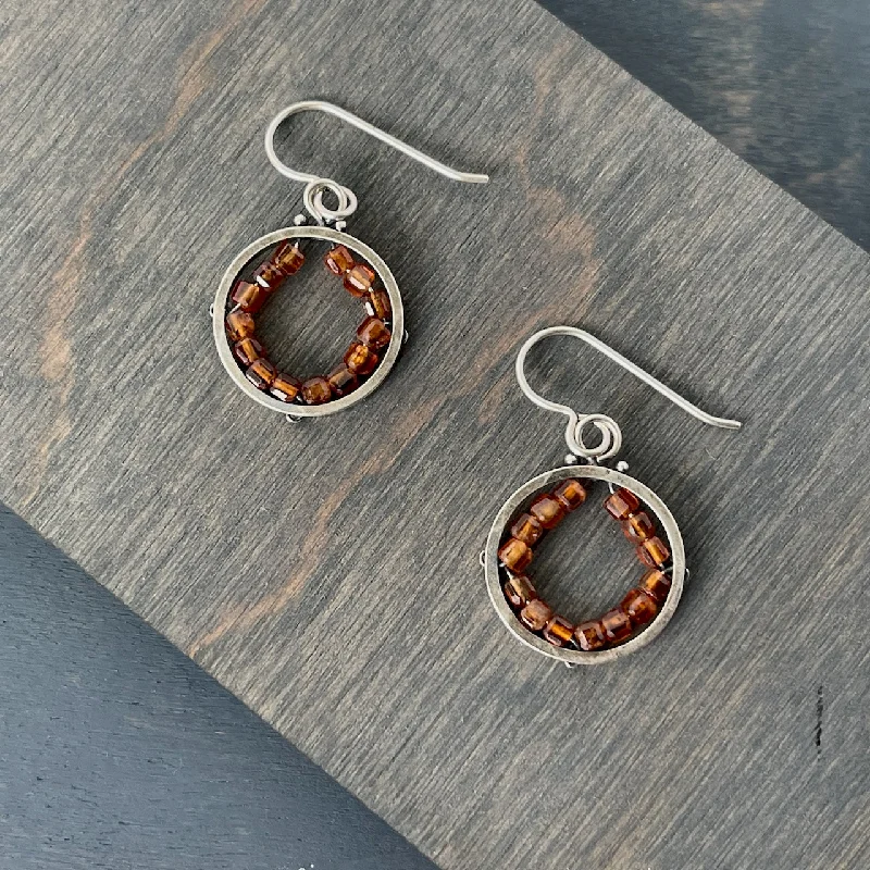 Hoop earrings with a matte black finish for a sleek, edgy vibe-Hessonite Garnet Circle Geode Earrings, small